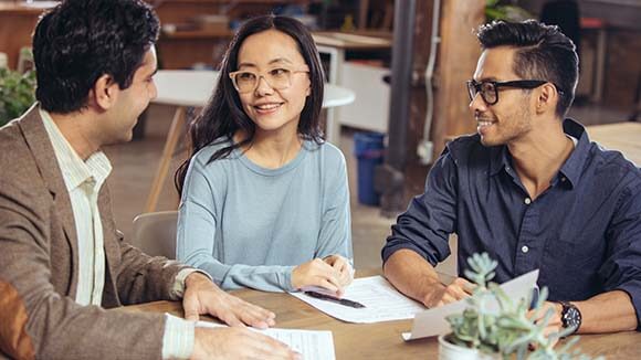 three people at meeting three people at meeting